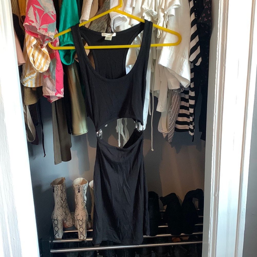 Black Mini Dress with silver ring decoration.